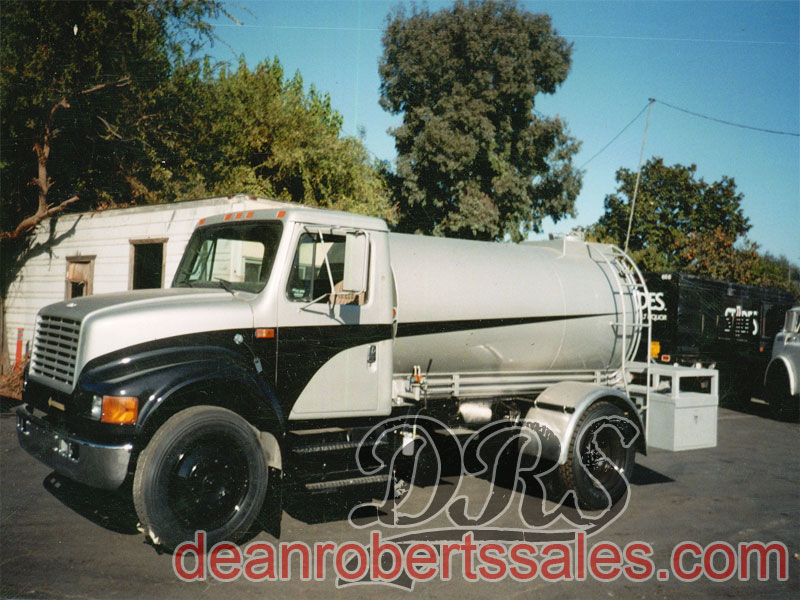 CUSTOM TRUCK MOUNTED SEALCOAT TANKS TRUCKS AND MIXERS.